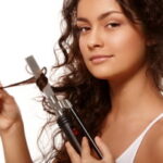 Beauty portrait with curling iron